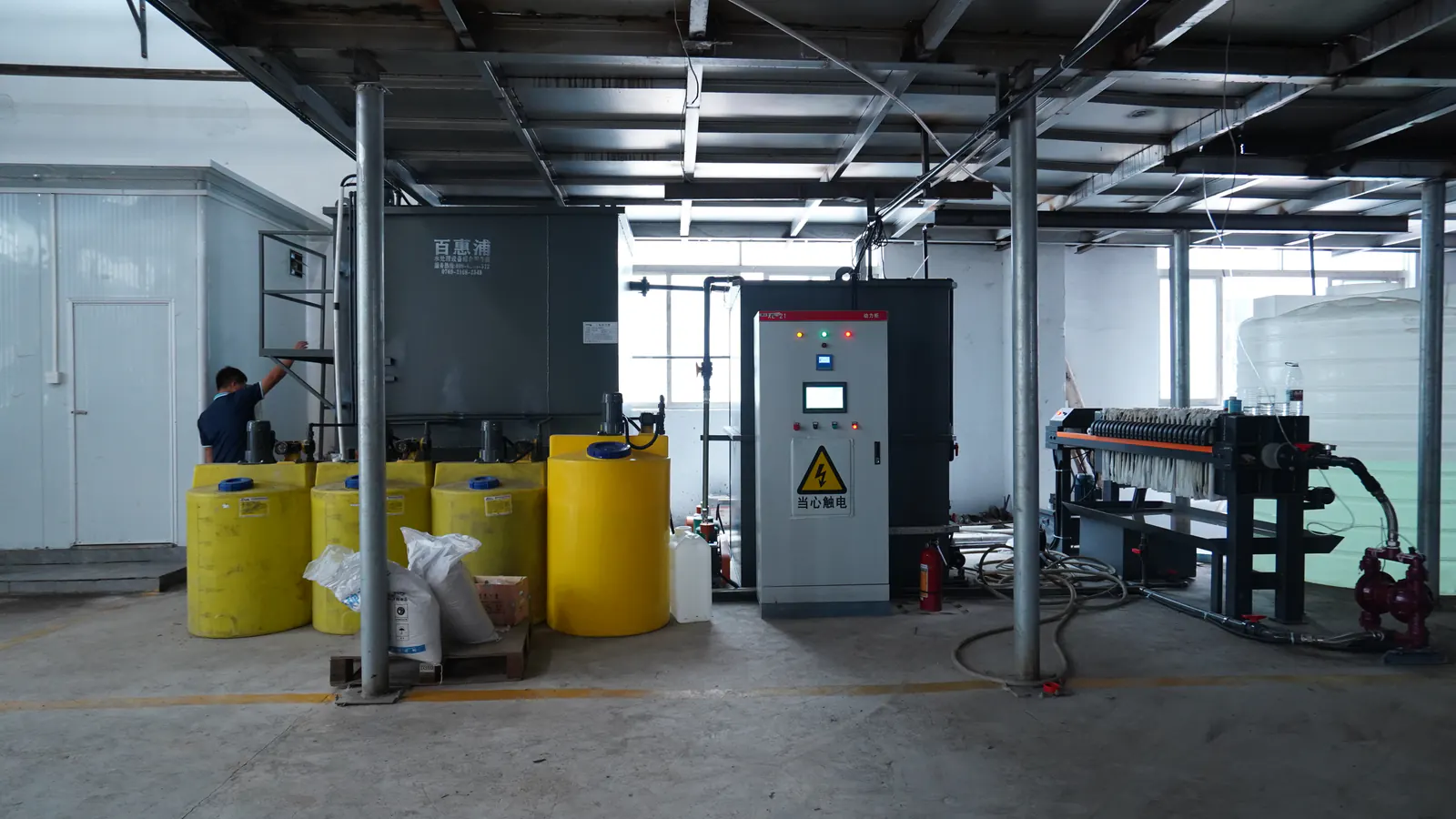 Industrial heavy metal wastewater treatment system with dosing tanks, control cabinet and filter press