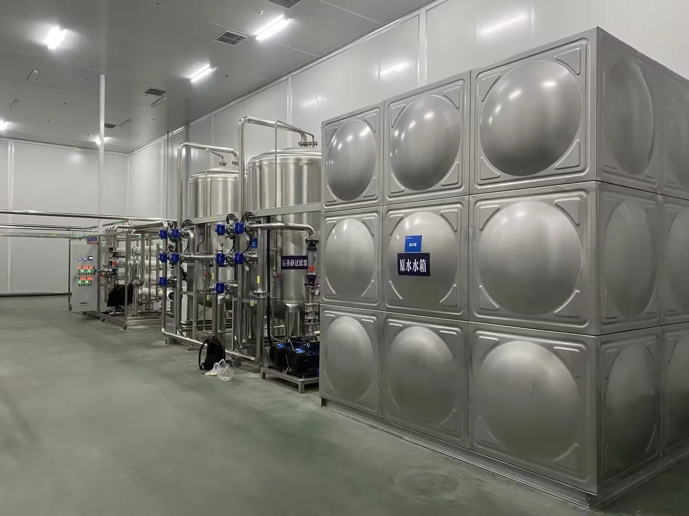 Stainless-steel pretreatment vessels, pumps and raw-water storage for a battery manufacturing high-purity water system