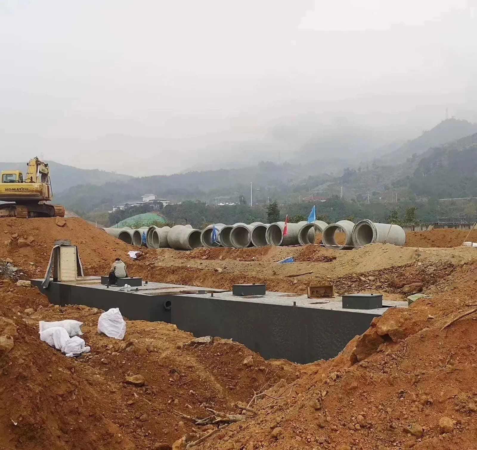 Civil site preparation for buried industrial wastewater treatment structures